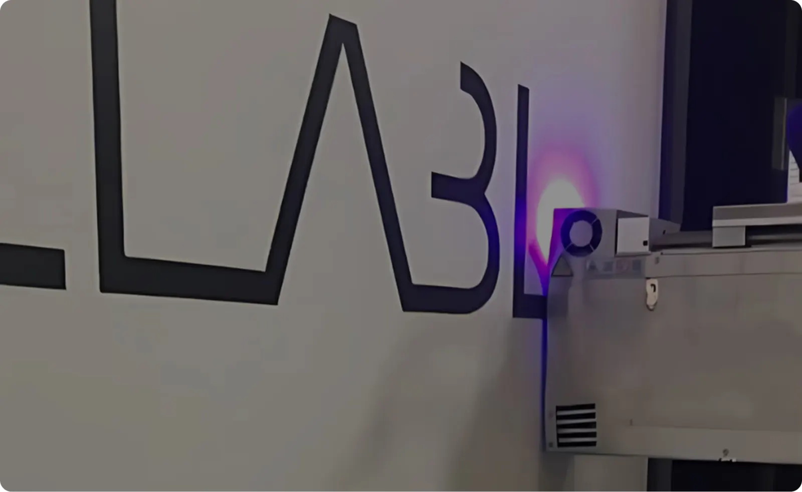 A wall printer in the Vertical Printers workshop